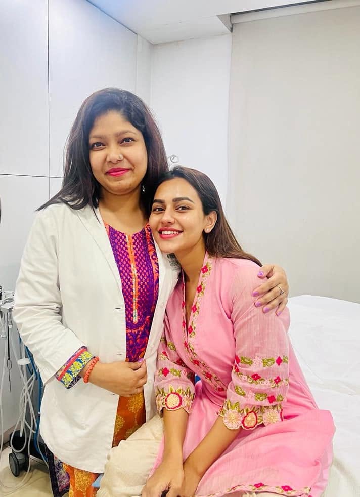 Dr. Rabeya Afroz Shoma with a client after personalized care